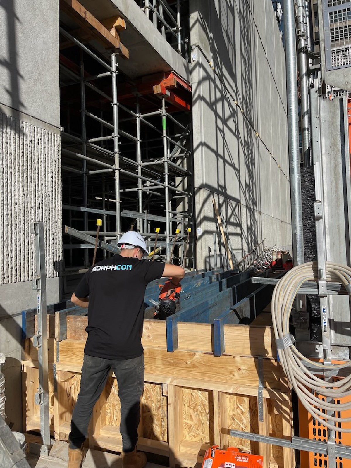 Access bridge connection to existing Alimak, base and mast