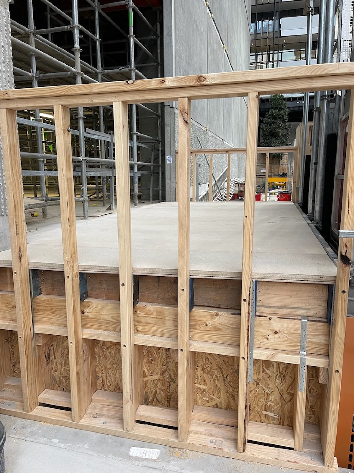 Installed banner rails along the access bridge